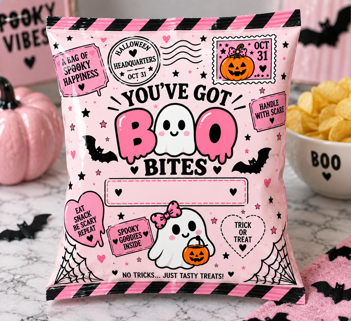 a pink bag with a ghost and pumpkins on it