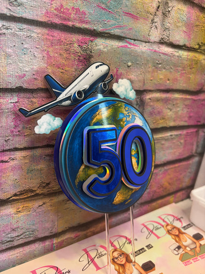 a blue round sign with a plane and earth on it